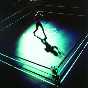 Female boxer shadow boxing in Balazs boxing ring